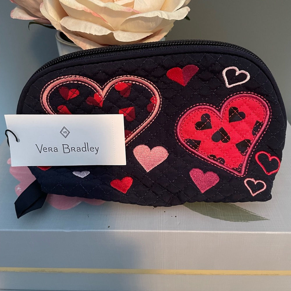 Cute Vera Bradley clamshell cosmetic bag.